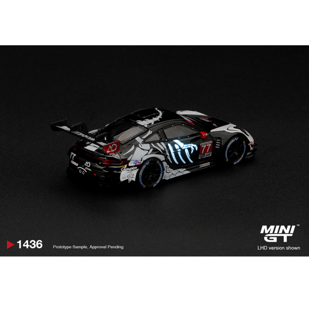 Mini GT Porsche 911 GT3 R (992) #77 AO Racing “Skeleton Rexy” 2026 IMSA Petit Le Mans – (Glow in the Dark) – Limited Edition (Preorder)