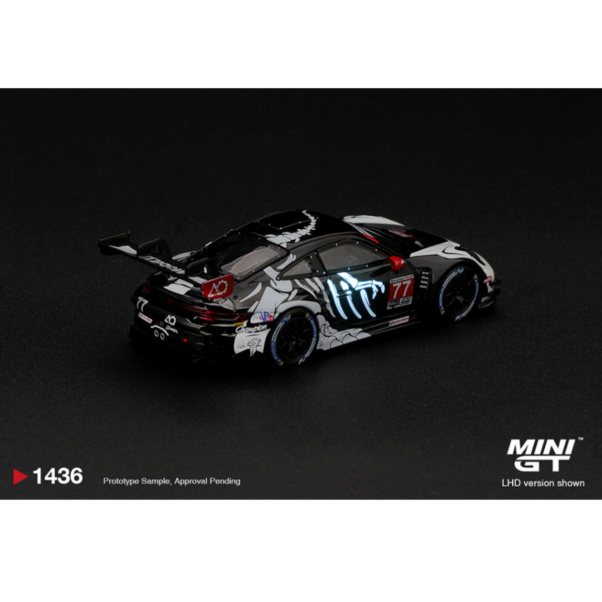 Mini GT Porsche 911 GT3 R (992) #77 AO Racing “Skeleton Rexy” 2026 IMSA Petit Le Mans – (Glow in the Dark) – Limited Edition (Preorder)