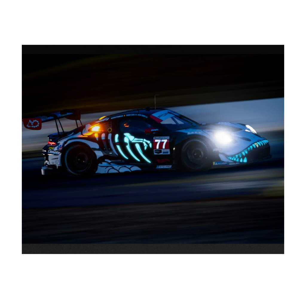 Mini GT Porsche 911 GT3 R (992) #77 AO Racing “Skeleton Rexy” 2026 IMSA Petit Le Mans – (Glow in the Dark) – Limited Edition (Preorder)